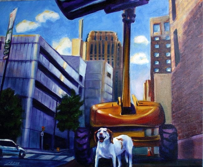 Lyla-belle the beagle walking past city buildings and a large sculpture at dusk